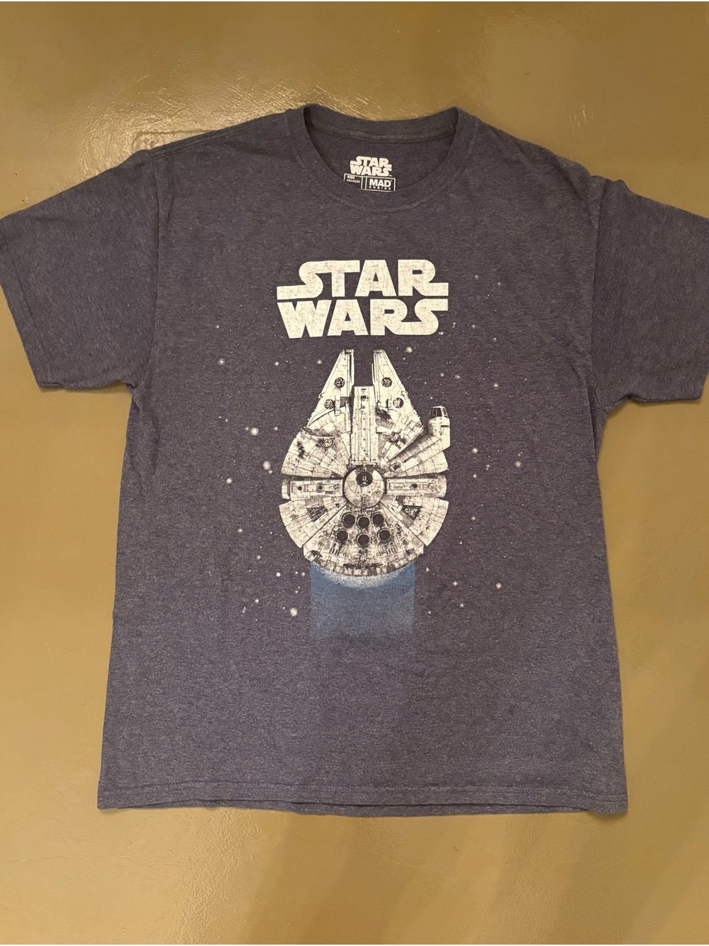 heather blue Star Wars Millennium Falcon t-shirt by Mad Engine
